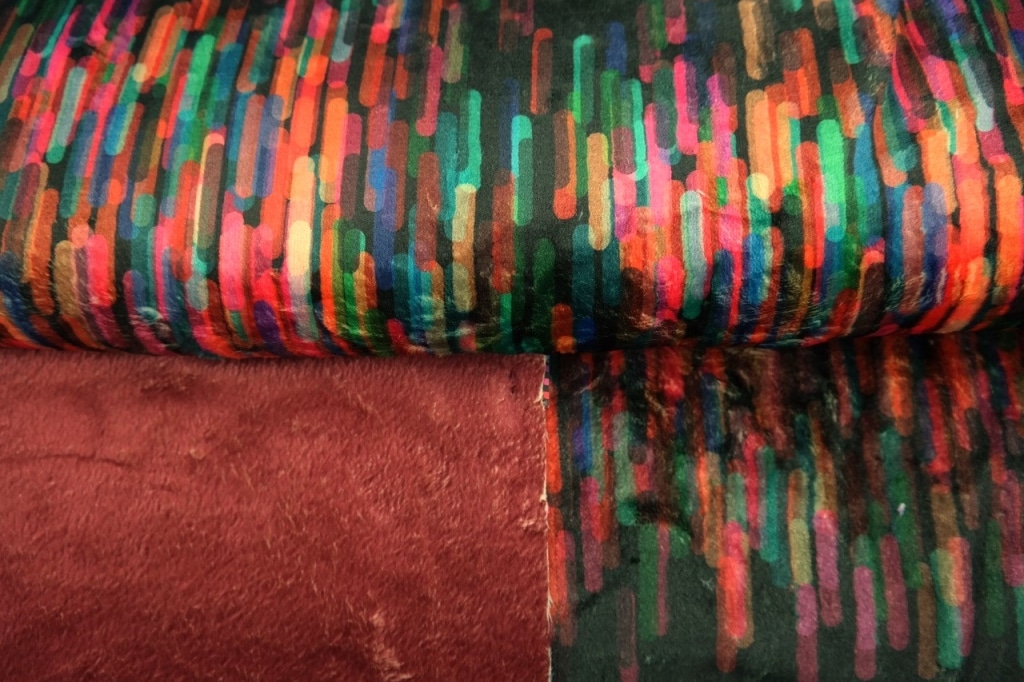 Polaire doudou fourrure imprimé trait multicolore Stenzo