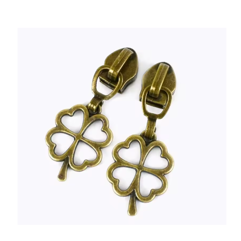 Curseur trefle bronze maille nylon 5mm